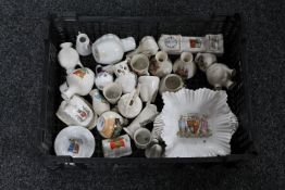 A basket of a quantity of antique tourist china