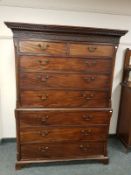 A George III mahogany double chest of eight drawers, on bracket feet,