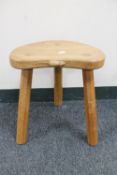 A Robert 'Mouseman' Thompson of Kilburn oak tripod stool,
