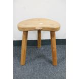 A Robert 'Mouseman' Thompson of Kilburn oak tripod stool,