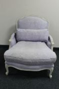 A painted frame continental style armchair upholstered in a purple brocade