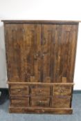 A Laura Ashley double door television cabinet fitted six drawers beneath