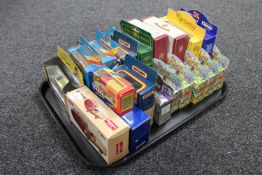 A tray containing twenty-eight boxed die cast vehicles including Corgi, Matchbox,