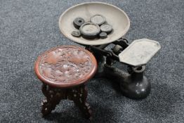 A set of vintage kitchen scales with weights together with a small folding hardwood table