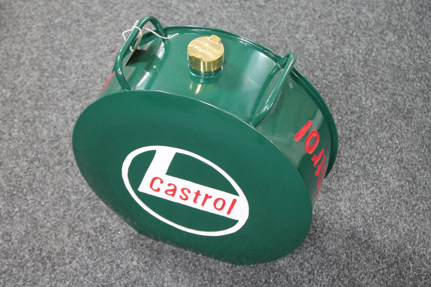 A cylindrical Castrol oil can