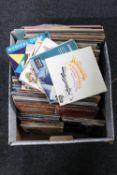 A box containing a quantity of LP's and 7" singles; Rod Stewart, Barbara Streisand,