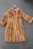 A lady's mink fur coat bearing label Maurice Melody (Furs) Park Lane,