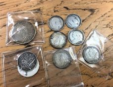 Eight assorted silver coins (8)