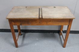 A mid 20th century double school desk