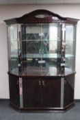 An Italianate high gloss four door display cabinet fitted cupboards beneath CONDITION
