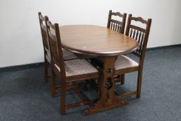 A six piece contemporary oak dining room suite comprising of triple door dresser,