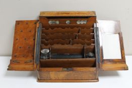 A Victorian walnut correspondence cabinet