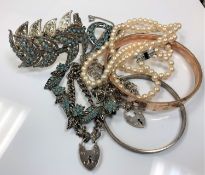 Two silver padlock bracelets, a rolled gold bangle, another bangle and a box of costume jewellery,