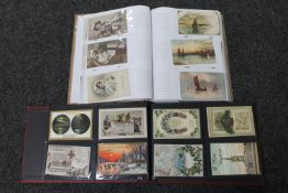 Two albums of antique Christmas postcards