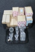 Two boxed Bohemian crystal decanters together with six boxed sets of six Bohemian crystal drinking