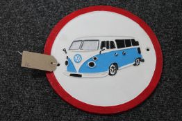 A cast iron VW plaque