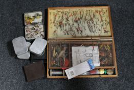 A large quantity of fishing flies some in cases and tins