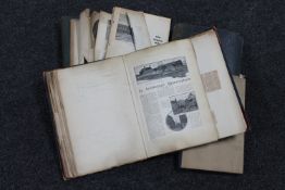 A box of antique journals containing paper, press cuttings,