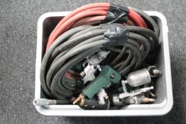 A box of compressor tools and hoses