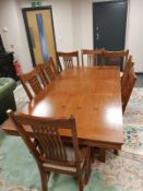 A contemporary Barker and Stonehouse inlaid oak extending dining table with leaf,