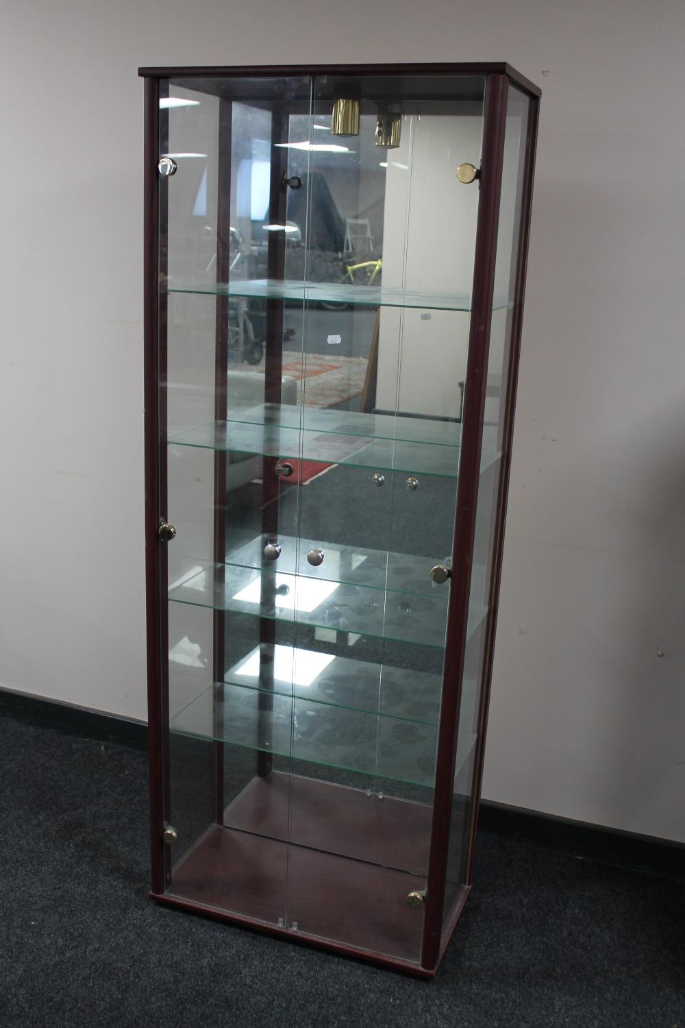 A contemporary glazed display cabinet