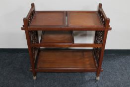An early 20th century mahogany trolley with lift out trays (Originally purchased from the Ideal
