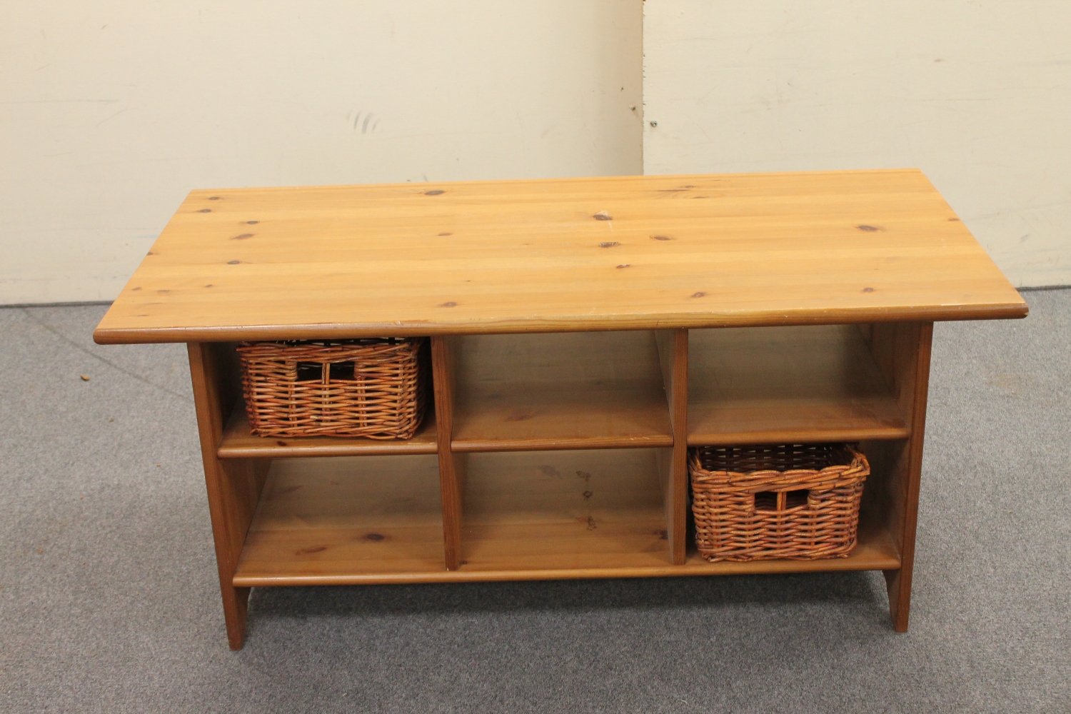 A pine low storage table