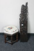 An African carving and a tapestry footstool