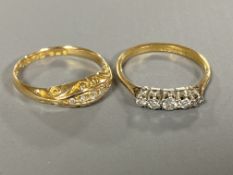 Two 18ct gold five stone diamond rings (2)