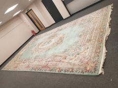 A very large Chinese carpet turquoise ground,