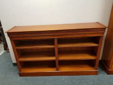 A yew wood open low bookcase,