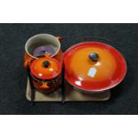 A Le Creuset twin handled cast iron wok with lid, fondue pot on stand,