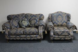 A contemporary two seater settee and matching armchair in two tone fabric