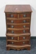 A reproduction mahogany multi drawer chest