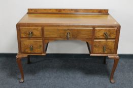 A Queen Anne style walnut dressing table