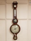 A Victorian mahogany banjo barometer with silvered dial,