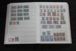 A Royal Mail stock book album containing a large quantity of stamps