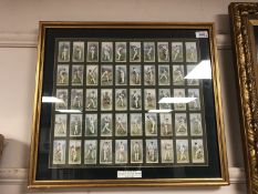 A framed cigarette card montage by Wills - "Cricketers",