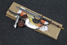 A boxed Spike Hunter fantasy knife and one other with wall mount