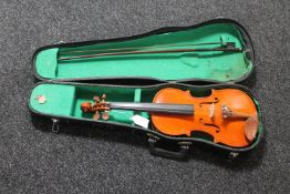 A violin with bow and shaped case 1/4 size by Stentor