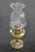A Victorian brass Benetfink oil lamp with etched shade and glass chimney