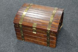 A brass bound pine trunk