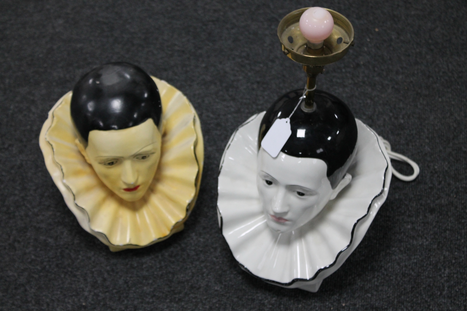 A plaster bust of Pierrot and a china Pierrot lamp
