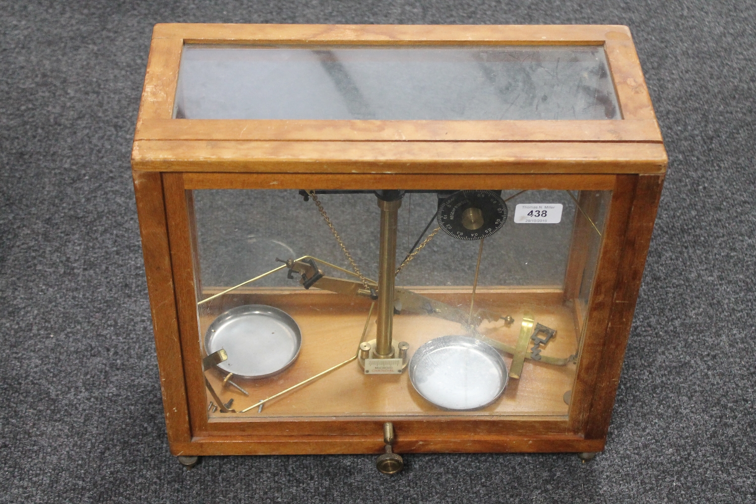 A set of chemist's scales in glazed box