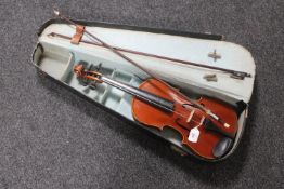 A German violin with case and bow,