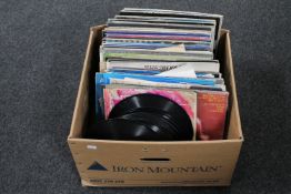 A box of vinyl LP records and 78's