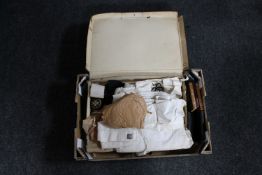 A box of quantity of St Johns Ambulance items, vintage clothes, belts, booklets,