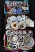 Four boxes of assorted china : Ringtons caddies and jugs, tea services, vases, planter,