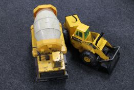 A Tonka Mighty Diesel digger and a cement mixer