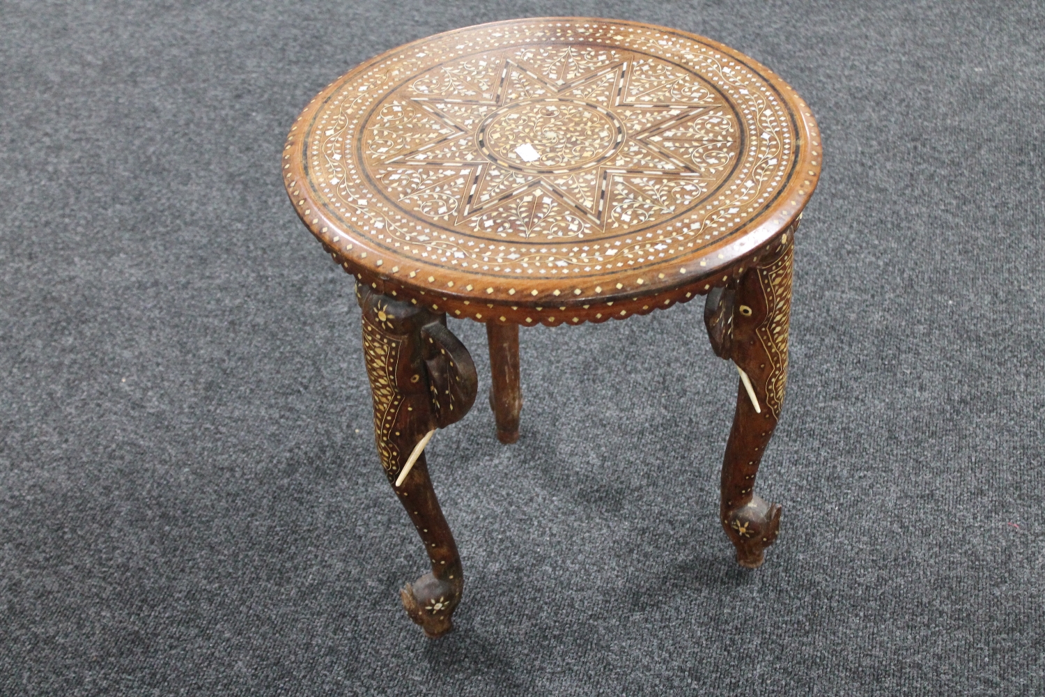 An early 20th century inlaid eastern occasional table